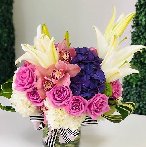 Shades of purple bouquet design by Rosy Flowers